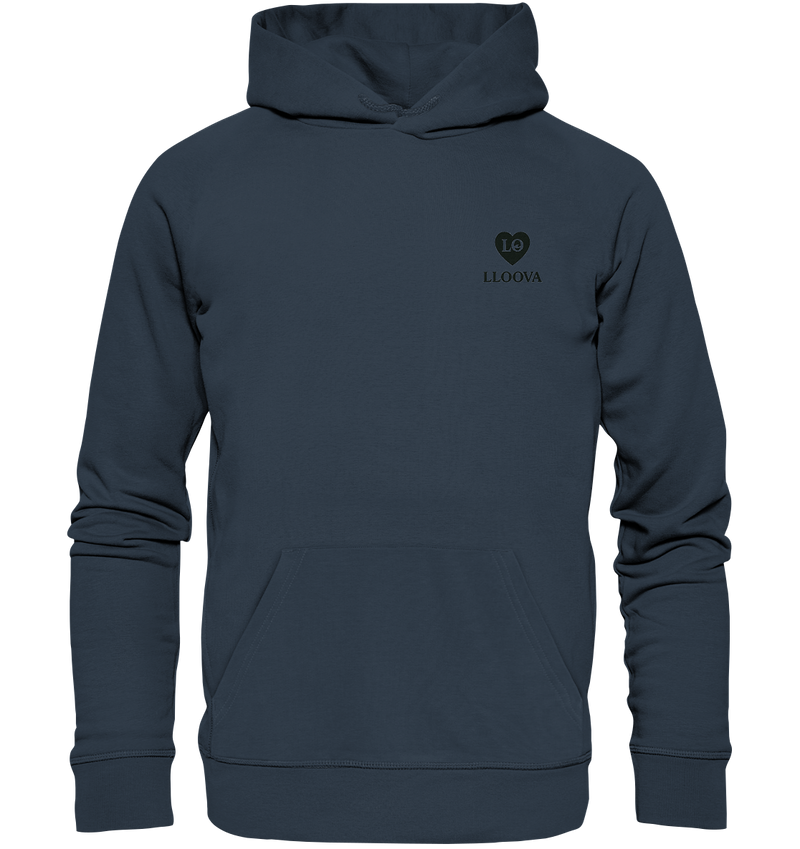 Female model wearing the Echo Hoodie while walking her dog in the city